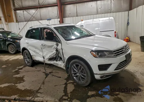2015 Volkswagen Touareg V6 z USA, uszkodzony, nr VIN WVGEF9BP0FD003190